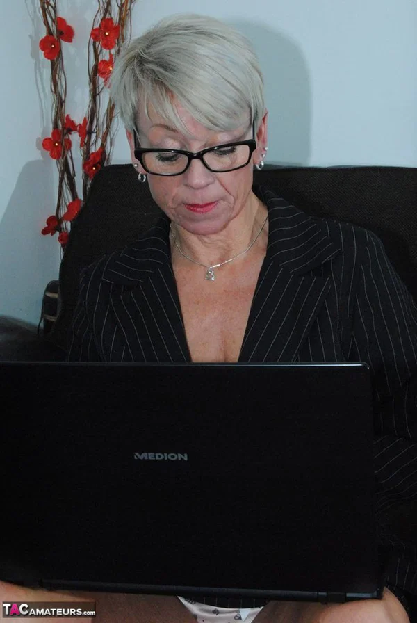 Mature lady Shazzy B sports short hair while exposing her upskirt underwear  - Mature, Secretary, Amateur, Non Nude, Short Hair, Glasses, Blonde, European, Clothed, Office  - Photo 5
