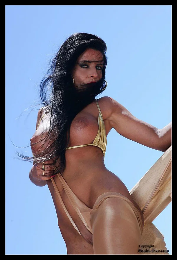 Brunette model Model Eve pulls om shiny pantyhose on seaside balcony  - Pantyhose, Mature, Fetish, MILF, Babe, Beautiful, Legs, Big Tits, Outdoor, High Heels  - Photo 8