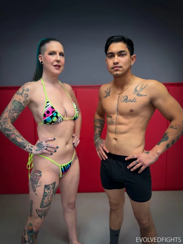 Tattooed wrestler Nikki Zee getting stripped and fucked by her partner  - Photo 2