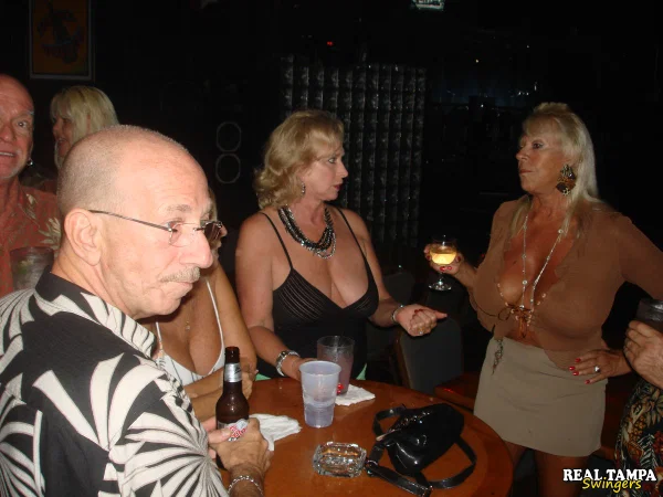 Amateur swingers show off her big breasts at a wild party at the bar  - Granny, Swingers, Mature, Amateur  - Photo 2