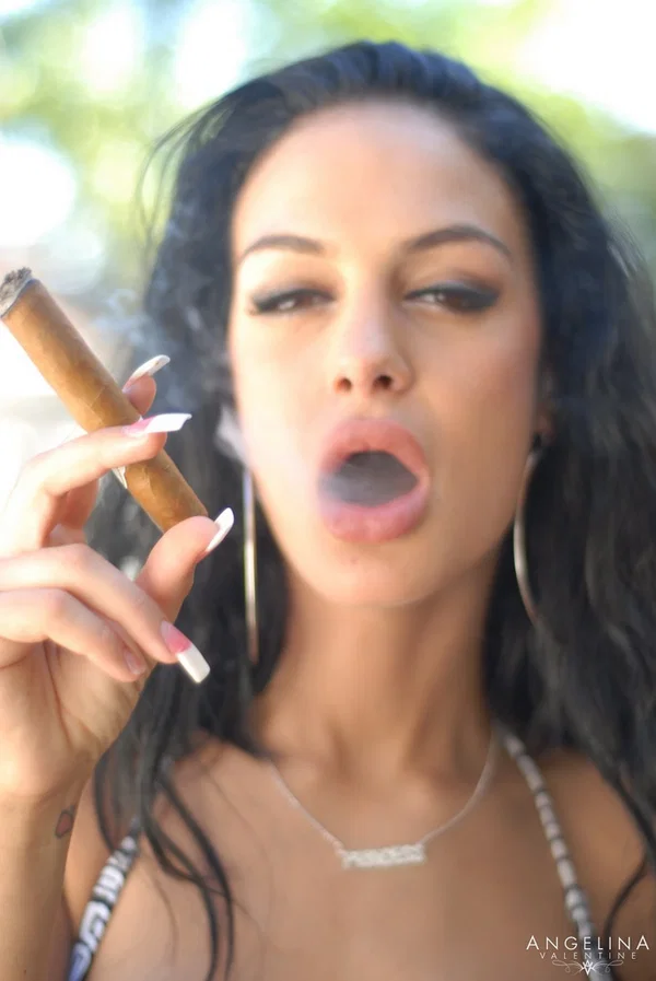 Alluring brunette chick Angelina Valentine goes topless while smoking a cigar  - Smoking, Pornstar, Latina, MILF, Big Tits, Brunette, Fake Tits  - Photo 11