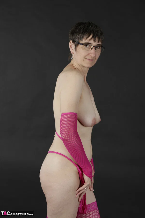 Mature amateur gets naked in pink arm socks and stockings with her glasses on  - Saggy Tits, Mature, Glasses, Short Hair, Lingerie, Amateur, Stockings, Brunette, European  - Photo 8