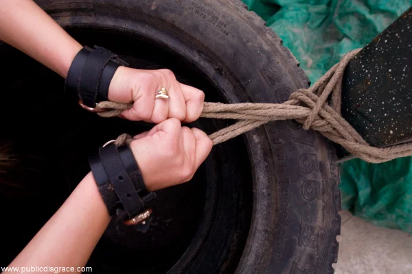 Jennifer Love is restrained in a tire before giving oral sex in public  - Bondage, Fetish, Public, Perfect, BDSM, Babe, Beautiful, Spreading, White, Blonde  - Photo 8