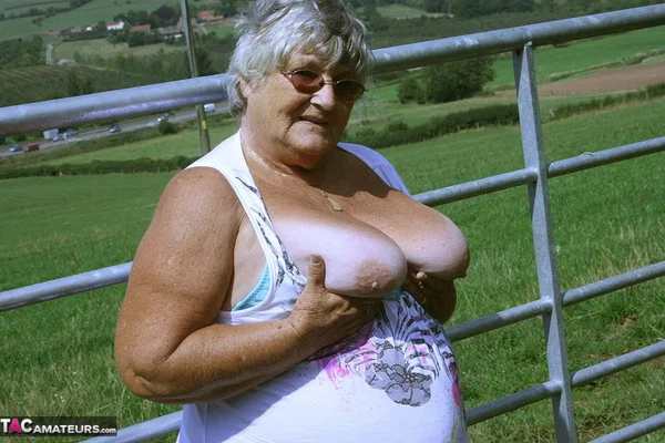 Old British woman Grandma Libby exposes herself next to a field of cattle  - Granny, BBW, Big Tits, Saggy Tits, Outdoor, Glasses, Amateur, European, Chubby, Curvy  - Photo 5