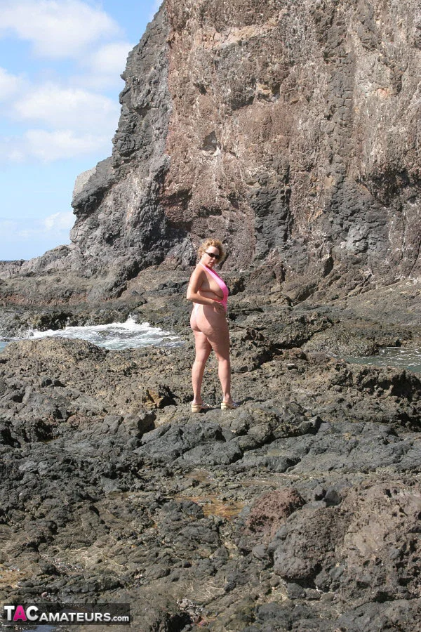 Amateur BBW Curvy Claire sets her large breasts free on seaside rocks  - Mature, Bikini, BBW, Curvy, MILF, Chubby, Glasses, Big Tits, Thick, Amateur  - Photo 6