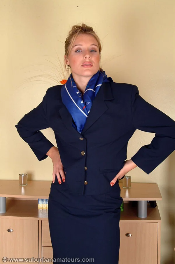 Sexy stewardess Angelina loses her uniform and spreads her hairy vagina  - Mature, British, Hairy, Tall, Spreading, Pussy, European, Uniform, Feet  - Photo 1