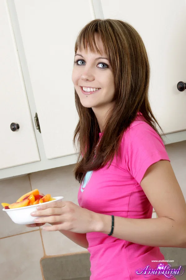 Petite teen Andi Land gets naked in her kitchen over a bowl of fruit  - Panties, Kitchen, Upskirt, Natural Tits, Undressing, Ass, Clothed, Beautiful, Skinny, Shaved  - Photo 1