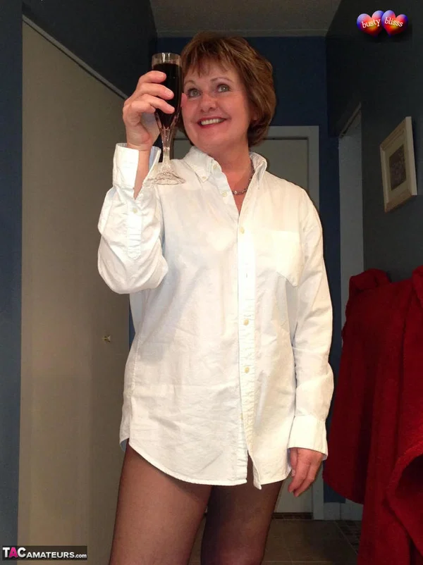 Older amateur Busty Bliss raises a toast before showing her painted toenails  - Mature, BBW, Amateur, Pantyhose, Feet, Chubby, Curvy, Panties, Thick, Spreading  - Photo 3