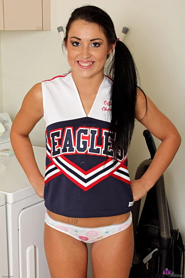 Young Latina girl Lola Foxx removes cheerleader attire during a SFW gig  - Cheerleader, Petite, Latina, Teen, Cute, Non Nude, Spreading, Amateur, Brunette, White  - Photo 5