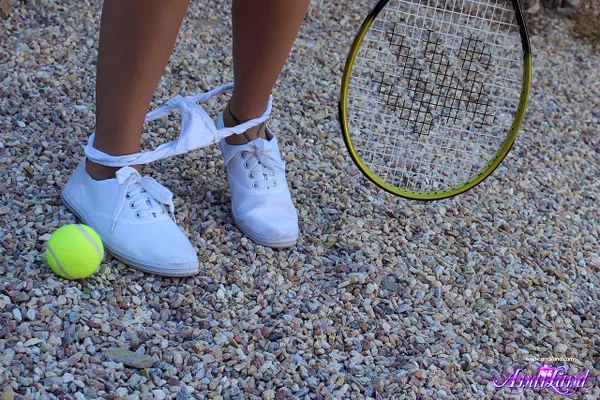 Teen girl Andi Land removes her upskirt panties while holding a tennis racket  - Sports, Teen, Cute, Amateur, Panties, Outdoor, Upskirt, Beautiful, Skirt, Skinny  - Photo 12