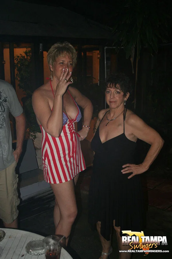 Playful amateur mature swinger wives teasing and French kissing at a party  - Swingers, Groupsex, Amateur, Reality, Clothed, Skirt, Big Tits, White, Short Hair, Upskirt  - Photo 5