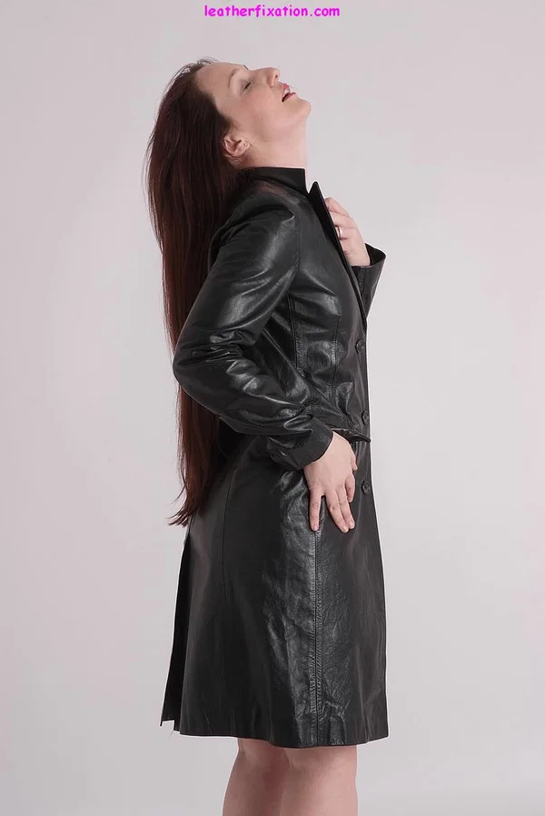 Solo model Sammy undoes a leather coat to expose her naked body underneath  - MILF, Leather, Clothed, Legs, Big Tits, High Heels  - Photo 2
