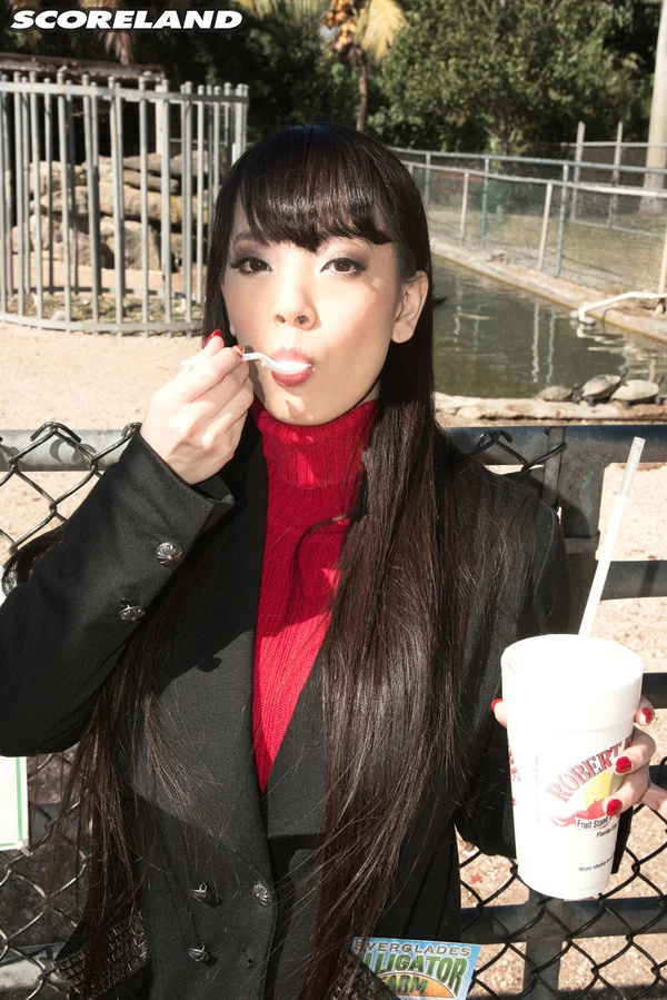 Asian girl with long hair Hitomi fills out her red sweater in non nude action  - Asian, Non Nude, Outdoor, Big Tits, Japanese, Jeans, Clothed, Babe, Natural Tits, Brunette  - Photo 1