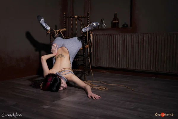 Solo girl Carmineworx is tied to a chair in a highly uncomfortable position  - BDSM, Clothed, Bondage, Stockings, High Heels, Nipples, Ass, Tattoo, Skirt, PAWG  - Photo 15