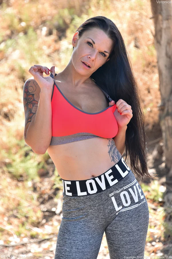 Brunette mature in yoga pants Veronica unveils her amazing big tits outdoors  - Yoga Pants, Sports, Public, MILF, Amateur, Big Tits, Clothed, Sexy, Outdoor, Non Nude  - Photo 1