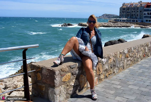 Mature fatty Chrissy walks by the sea with her round big tits bared  - Mature, Beach, BBW, Glasses, Amateur, Outdoor, Chubby, Blonde, MILF, European  - Photo 10
