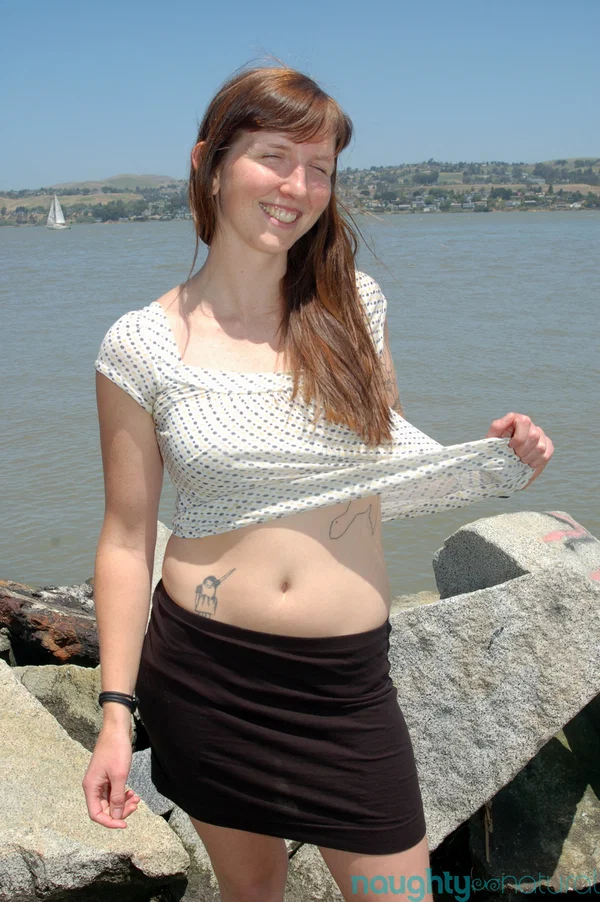 Smiley cutie Natalie strips on the beach and sunbathes her body & furry pussy  - Hairy, Amateur, White, Redhead, Outdoor, Tattoo, Natural Tits, Pale, Non Nude, Pussy  - Photo 4