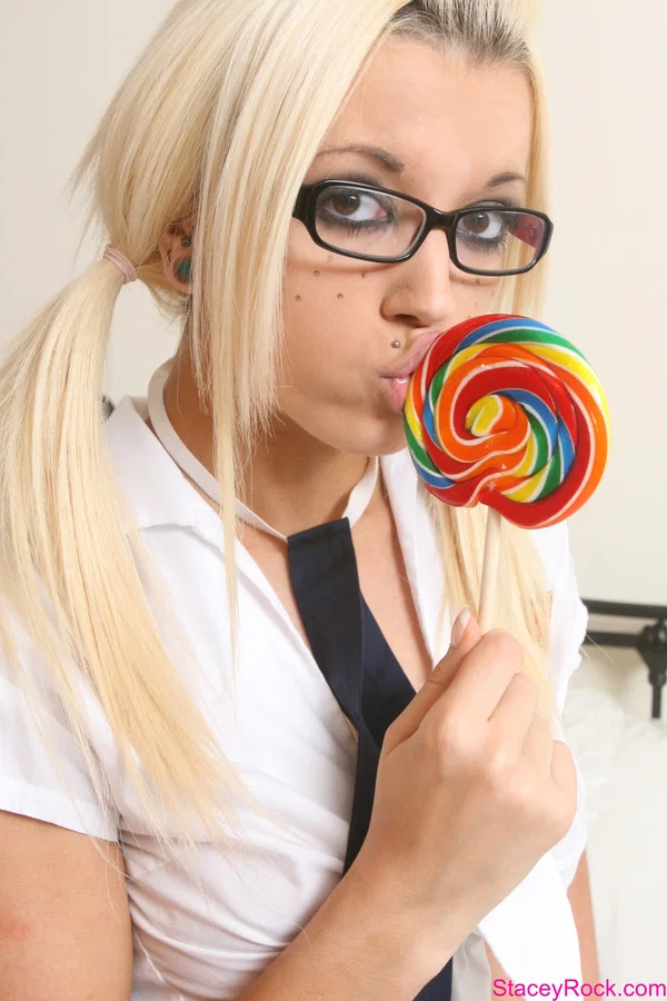 Hot British babe Stacey Rocks strips & touches herself as she licks a lollipop  - Blonde, British, Babe, Lesbian, White, Beautiful, Solo  - Photo 3
