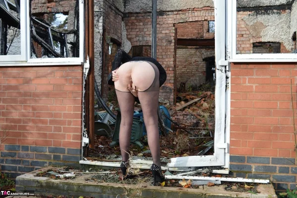 Amateur chick Barby Slut strips to her heels on a demolition site  - BBW, Mature, Glasses, Outdoor, Pantyhose, Chubby, High Heels, Short Hair, Skirt, Curvy  - Photo 11