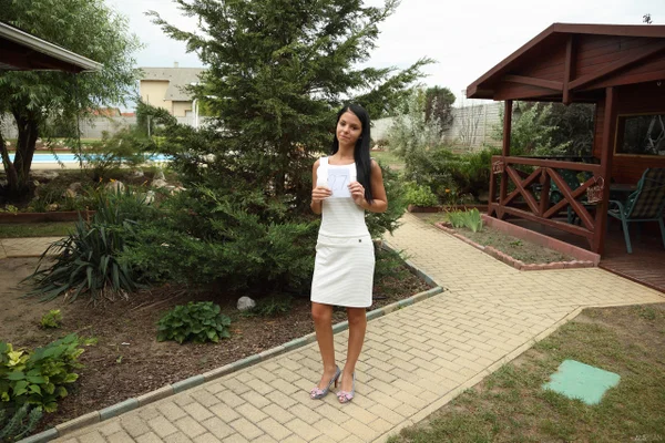 Dark-haired teen gets totally naked while in a backyard setting  - Public, Shaved, Amateur, Outdoor, Babe, High Heels, Tiny Tits, Teen, Ass, Skinny  - Photo 2