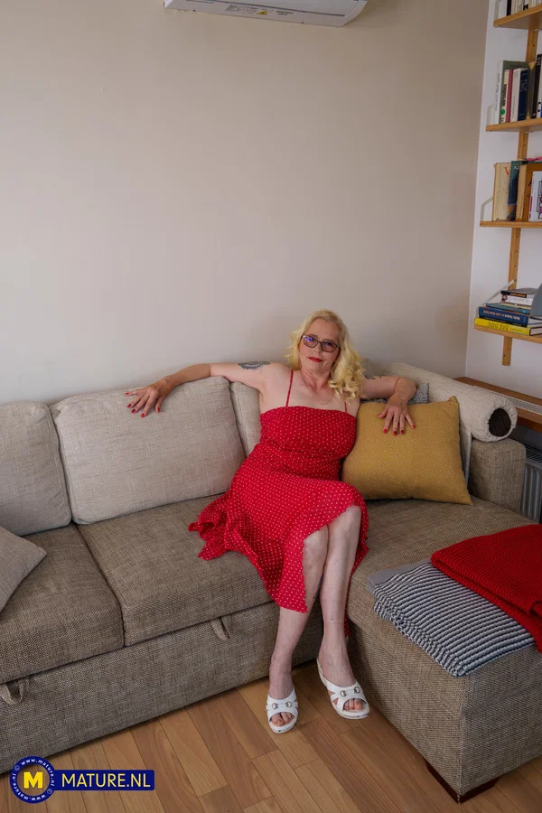 Kinky blonde mature in glasses Celeste lifts up her red dress & grabs her ass  - Mature, Cougar, BBW, Mom, Thick, Chubby, Amateur, Curvy, Glasses, Spreading  - Photo 1