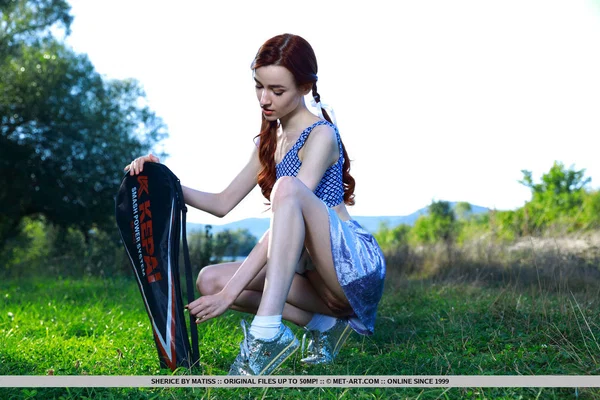 Young redhead Sherice pauses a badminton game to show her tight slit on grass  - Redhead, Spreading, Pussy, Ass, Asshole, Upskirt, Teen, Shaved, Outdoor, Face  - Photo 3