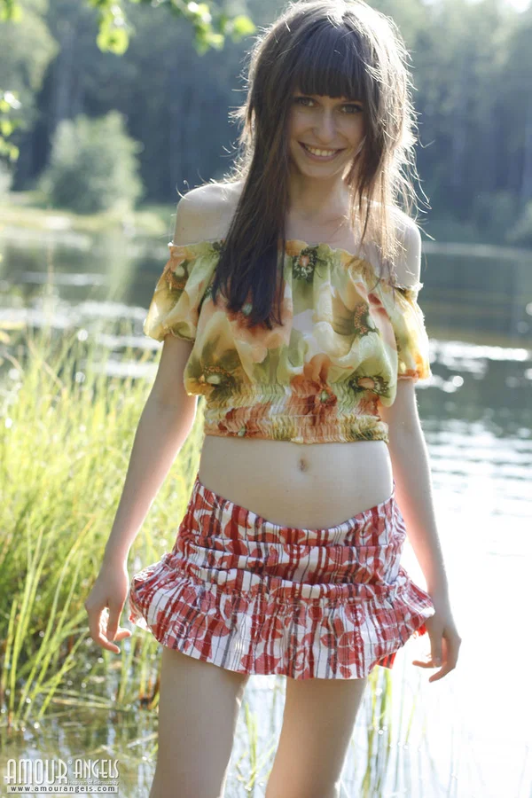 Beautiful teen Lena exposes her pert tits and bald cunt by the lake  - Teen, Outdoor, Skirt, Pussy, Babe, Brunette, Spreading, Upskirt, Clothed, Feet  - Photo 3
