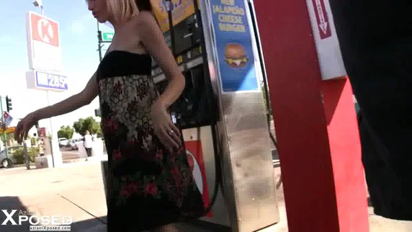 Middle-aged blonde Kylie Worthy exposes her big tits & pussy while pumping gas  - Photo 3
