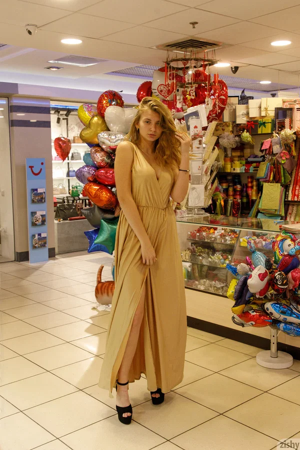 Ukrainian babe Regan Budimir flashes her big tit while posing at the mall  - Public, Beautiful, Ukrainian, Non Nude, Amateur, Curvy, Clothed, Jeans, PAWG, Chubby  - Photo 3