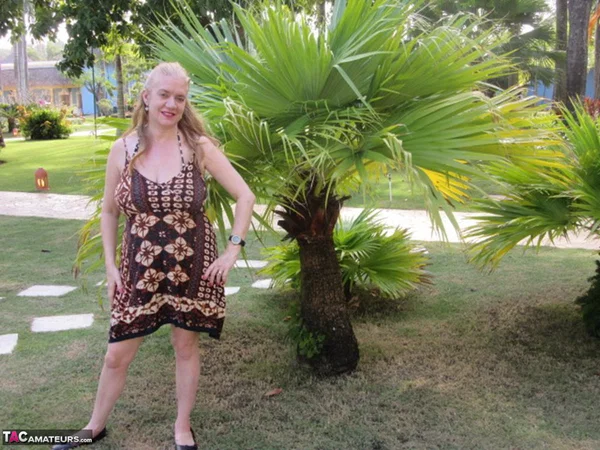 Older UK amateur Lily May sets her large boobs loose while walking on a beach  - SSBBW, BBW, Mature, Skirt, Non Nude, Amateur, Chubby, Beach, Curvy, Blonde  - Photo 2