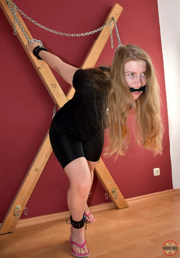 Experimental Yuly dons gags before being attached to a St Andrew's Cross  - BDSM, Bondage, Clothed, Non Nude  - Photo 6