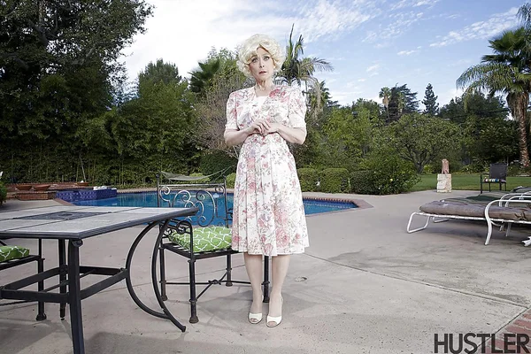 Mature pornstar Nina Hartley modelling outdoors in garters and nylons  - Mature, Stockings, Outdoor, Legs, Pornstar, High Heels, Pool, Ass, Blonde, Skirt  - Photo 2