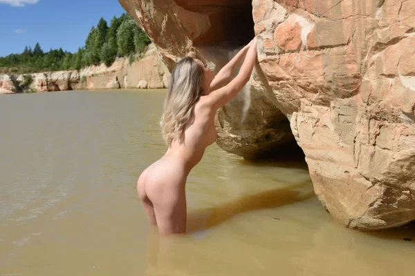 Young blonde Ava List shows her naked body in a pond near rock formations  - Teen, Model, Beautiful, Glamour, Cute, Babe, Solo  - Photo 15