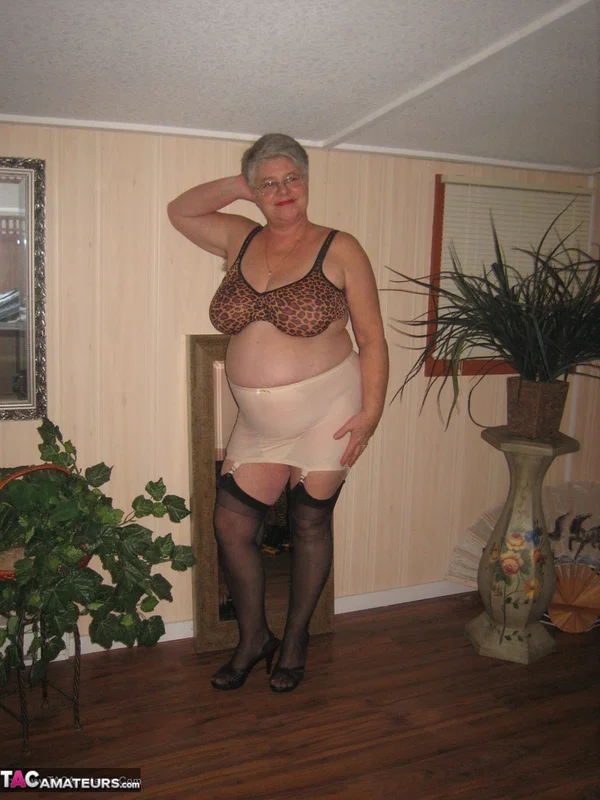 Fat granny unleashes her huge breasts before flashing no panty upskirt  - Granny, BBW, High Heels, Glasses, Stockings, Lingerie, Amateur, Short Hair, Ass, Chubby  - Photo 15