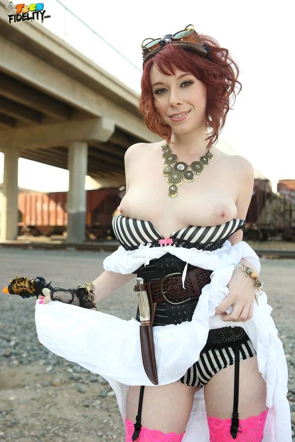 Redhead chick Zoey Nixon frees her teen tits from her Steam Punk outfit  - Cosplay, Redhead, Boots, Teen, Cute, Big Tits, Natural Tits, Glasses, Outdoor, Short Hair  - Photo 14
