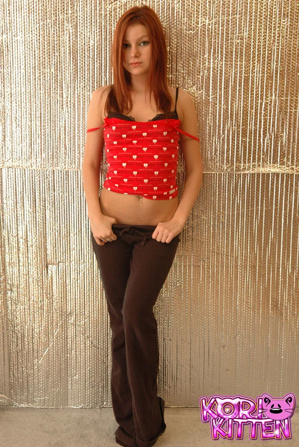 Natural redhead Korina Bliss exposes her ass crack during topless SFW action  - Redhead, Non Nude, Babe, Amateur, Piercing, Skinny, Ass, PAWG, Beautiful, Solo  - Photo 4