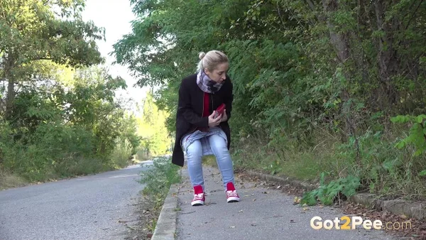 Pretty blonde Di Devi pulls down her jeans to pee on a public sidewalk  - Pissing, Public, Jeans, MILF, Pussy, Outdoor, Spreading, Shaved, Solo, Close Up  - Photo 3