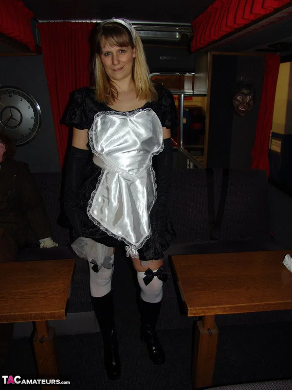 Blonde maid Sweet Susi takes off her uniform while inside a motorhome  - Maid, Mature, MILF, Upskirt, Amateur, Pussy, Boots, Ass, Stockings, Spreading  - Photo 7
