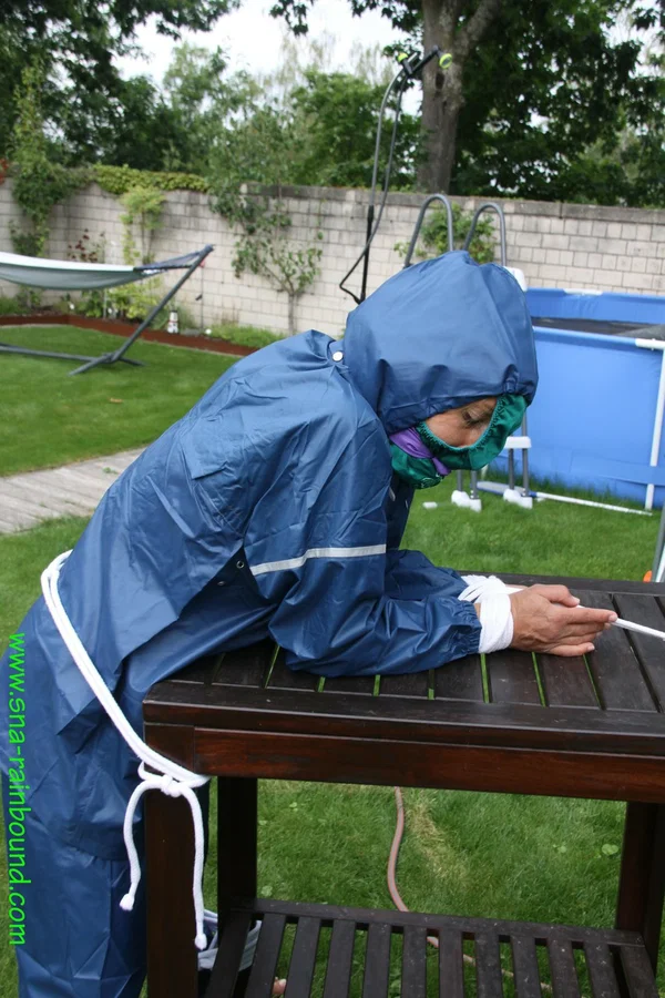 Caucasian woman is tied to a table in a yard with panties over her face  - Amateur, BDSM, Outdoor, Bondage, Non Nude, Clothed, Ass, PAWG  - Photo 11