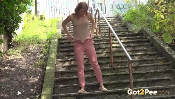 Chrissy Fox checks behind her while peeing on a flight of public steps  - Pissing, Public, Redhead, Czech, Outdoor, Pussy, Close Up, Non Nude, Shaved, Beautiful  - Photo 13
