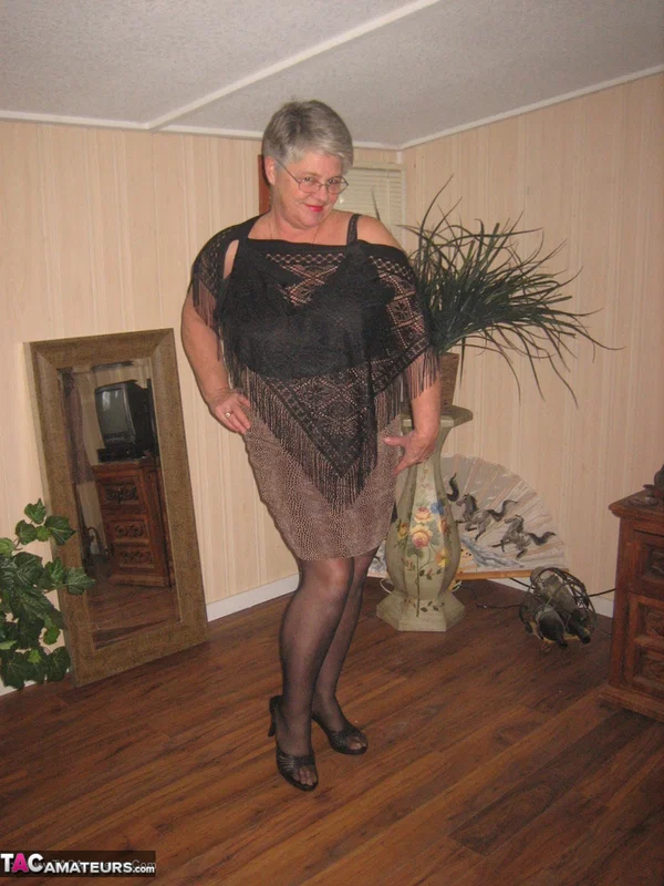 Fat granny unleashes her huge breasts before flashing no panty upskirt  - Granny, BBW, High Heels, Glasses, Stockings, Lingerie, Amateur, Short Hair, Ass, Chubby  - Photo 2