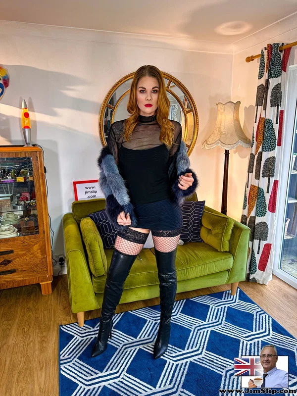 Sexy redhead models a fur coat and black miniskirt in thigh-high boots  - Leather, Redhead, Stockings, Clothed, Upskirt, High Heels, Skirt, Amateur, Beautiful, Non Nude  - Photo 10