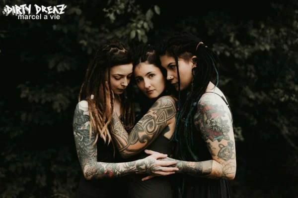 Three tattooed girls share lesbian kisses in long grass near a fir tree  - Tattoo, Humping, Threesome, Fetish, Lesbian, Ass, Ass Licking, Outdoor, Pigtails, Kissing  - Photo 11