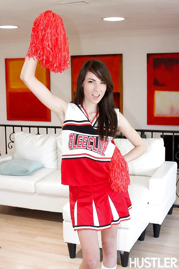 Naughty teen girl Emily Grey posing solo in sexy cheerleader uniform  - Cheerleader, Teen, Skinny, Pornstar, Socks, Babe, Ass, Clothed, Skirt, Upskirt  - Photo 2