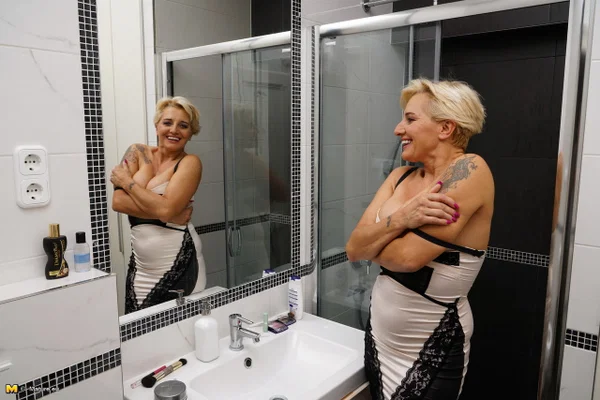 Aged housewife with short hair and a few extra kilos masturbates in the shower  - Mature, BBW, Big Tits, Tattoo, Shower, Chubby, Clothed, Bath, Blonde, Curvy  - Photo 8