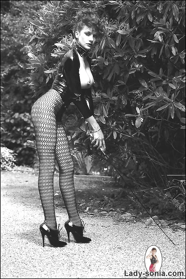 Leggy lady in fetish outfit exposing her boobs in vintage photo set  - Lingerie, Pantyhose, Mature, Fetish, Outdoor, Big Tits, Fake Tits, Vintage  - Photo 14