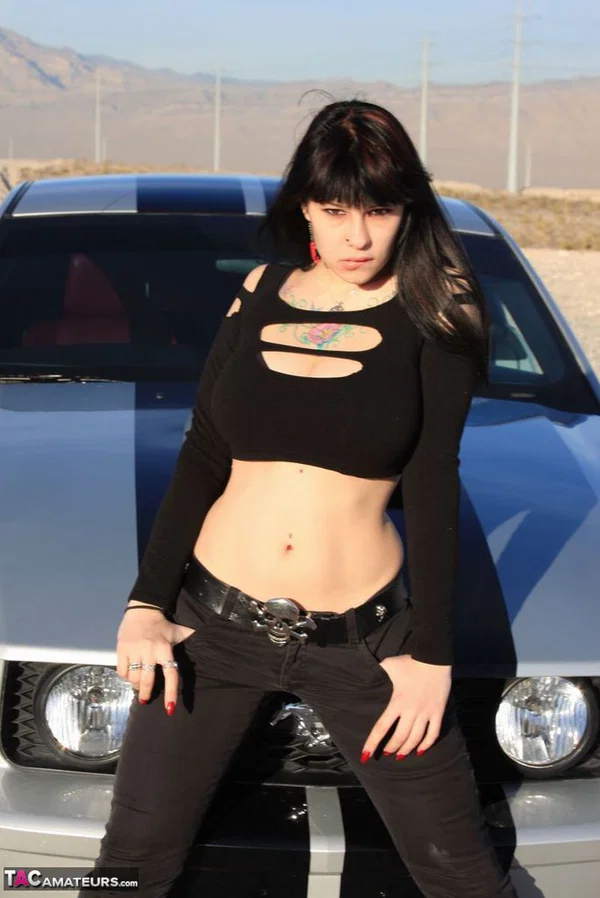 Brunette amateur Susy Rocks models by a muscle car during a safe for work gig  - Outdoor, Tall, Ass, Amateur, PAWG, Beautiful, Solo, Brunette, Non Nude  - Photo 19