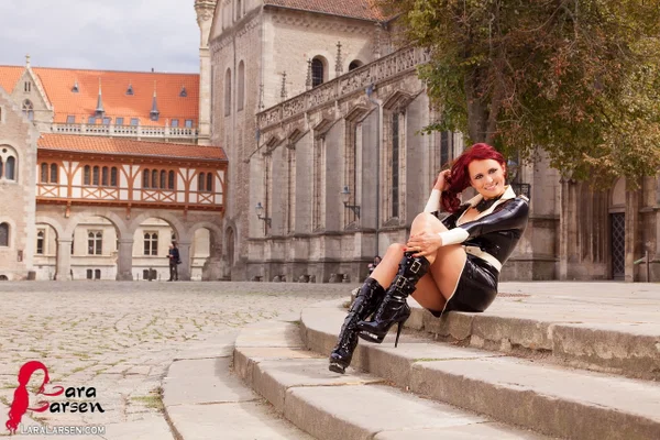 Redhead amateur Lara Larsen models latex clothing and boots on cobblestone  - Public, Fetish, Non Nude, Latex, Redhead, Amateur, Clothed, Boots, Skirt, High Heels  - Photo 2