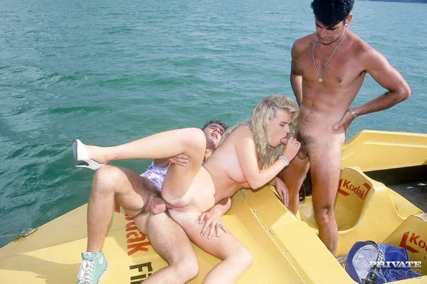Busty blonde gets involved in a double penetration on top of a paddle boat  - Double Penetration, Outdoor, Facial, Groupsex, Blonde, Anal, Cumshot, Blowjob, Threesome, Clothed  - Photo 7