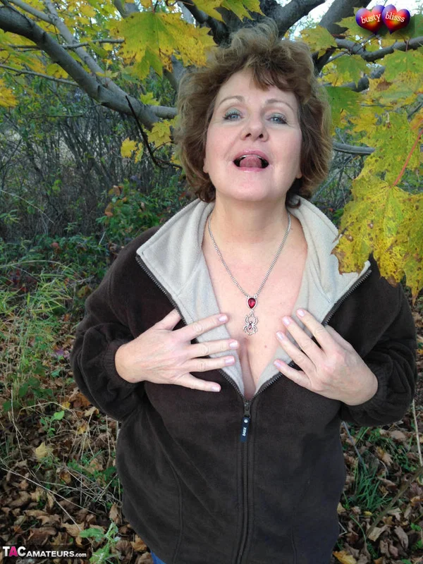Older woman Busty Bliss exposes her big natural tits under a tree in the fall  - Mature, Saggy Tits, BBW, Amateur, Outdoor, Clothed, Curvy, Short Hair, Chubby, Thick  - Photo 3